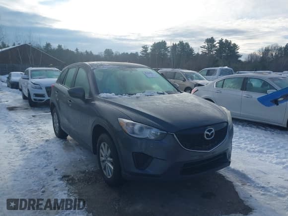 ✅ 2014 Mazda CX-5 Sport • VIN: JM3KE2BEXE0398881 • Lot: 43848471. Listed on IAAI with 173,392 mi. Free auction sales archive from the USA and detailed vehicle history report at DreamBid. Image 1.