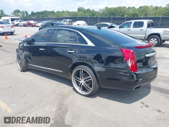 ✅ 2013 Cadillac XTS Platinum • VIN: 2G61U5S34D9172463 • Lot: 42871387. Listed on IAAI with 141,152 mi. Free auction sales archive from the USA and detailed vehicle history report at DreamBid. Image 3.