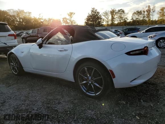 ✅ 2020 Mazda MX-5 Miata Grand Touring • VIN: JM1NDAD7XL0410784 • Lot: 76585414. Listed on Copart with Not provided. Free auction sales archive from the USA and detailed vehicle history report at DreamBid. Image 2.