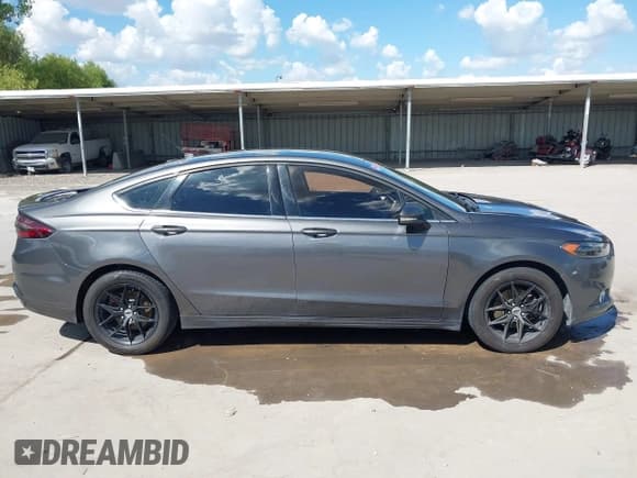 ✅ 2016 Ford Fusion SE • VIN: 3FA6P0H94GR239298 • Lot: 43304439. Listed on IAAI with 206,921 mi. Free auction sales archive from the USA and detailed vehicle history report at DreamBid. Image 13.