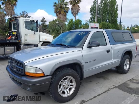 ✅ 2002 Dodge Dakota • VIN: 1B7FL16X62S537717 • Lot: 42261629. Wystawiony na IAAI z przebiegiem Nie podano. Bezpłatny archiwum sprzedaży aukcyjnych z USA i szczegółowy raport historii pojazdu na DreamBid. Zdjęcie 6.