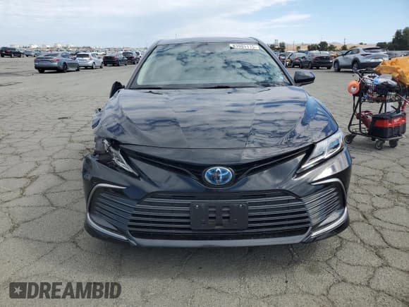 ✅ 2022 Toyota Camry Hybrid LE • VIN: 4T1C31AKXNU571369 • Lot: 83985115. Listed on Copart with 82,523 mi. Free auction sales archive from the USA and detailed vehicle history report at DreamBid. Image 5.