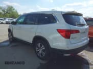✅ 2018 Honda Pilot EX-L • VIN: 5FNYF6H57JB045332 • Lot: 42064344. Listed on IAAI with 140,129 mi. Free auction sales archive from the USA and detailed vehicle history report at DreamBid. Image 3.