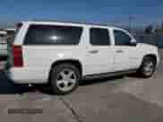 2007 Chevrolet Suburban LTZ with VIN 1GNFC16017R400130, listed as a Copart auction lot 91052515 with 177,895 mi miles and Salvage title. Bid and sale history available at DreamBid. Image 3.