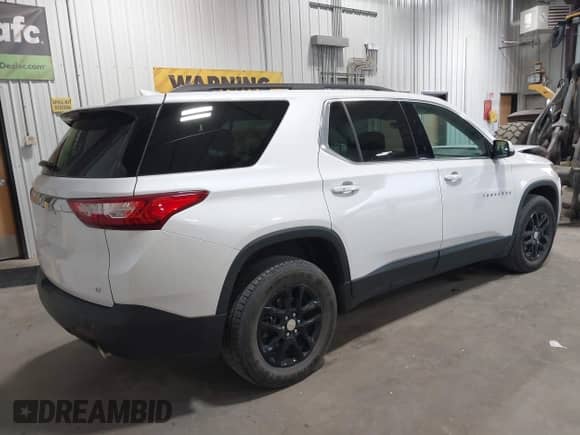 2019 Chevrolet Traverse LT Cloth z VIN 1GNEVGKW1KJ298306, wystawiony jako IAAI lot #43302460 z przebiegiem 76 785 mil mil oraz . Historia ofert i sprzedaży dostępna na DreamBid. Obrazek 4.
