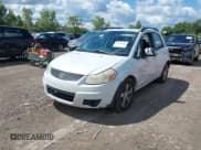 ✅ 2012 Suzuki SX4 Crossover • VIN: JS2YB5A39C6307497 • Lot: 43069740. Wystawiony na IAAI z przebiegiem 149 049 mil. Bezpłatny archiwum sprzedaży aukcyjnych z USA i szczegółowy raport historii pojazdu na DreamBid. Zdjęcie 2.