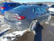 ✅ 2021 Acura TLX • VIN: 19UUB5F33MA005656 • Lot: 41435469. Listed on IAAI with 56,691 mi. Free auction sales archive from the USA and detailed vehicle history report at DreamBid. Image 4.