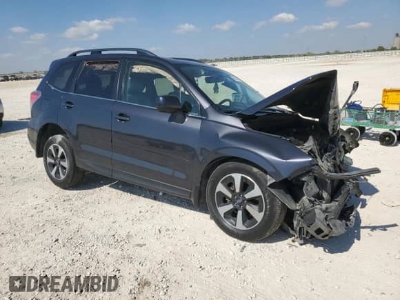 2017 Subaru Forester Limited with VIN JF2SJARC7HH419714, listed as a Copart auction lot 86193765 with 137,110 mi miles and Salvage title. Bid and sale history available at DreamBid. Image 4.