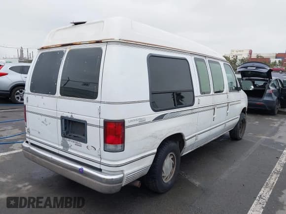 ✅ 1995 Ford Econoline Cargo • VIN: 1FDEE14H6SHA34327 • Lot: 42402378. Listed on IAAI with Not provided. Free auction sales archive from the USA and detailed vehicle history report at DreamBid. Image 4.