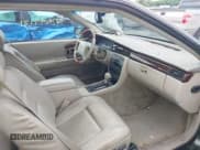 ✅ 2001 Cadillac Eldorado ESC • VIN: 1G6EL12Y01B107760 • Lot: 42797121. Wystawiony na IAAI z przebiegiem 86 446 mil. Bezpłatny archiwum sprzedaży aukcyjnych z USA i szczegółowy raport historii pojazdu na DreamBid. Zdjęcie 5.