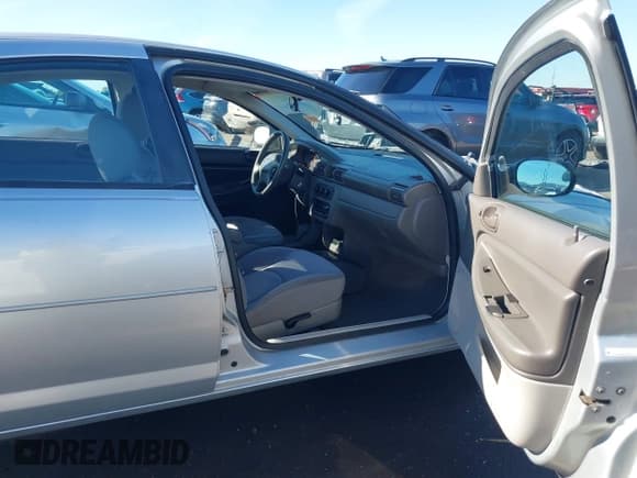 ✅ 2005 Chrysler Sebring • VIN: 1C3EL46X35N659374 • Lot: 43840188. Listed on IAAI with 137,495 mi. Free auction sales archive from the USA and detailed vehicle history report at DreamBid. Image 5.