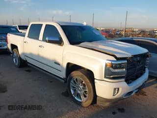 ✅ 2018 Chevrolet Silverado 1500 High Country • VIN: 3GCUKTEJ6JG452823 • Лот: 43385719. Опубликован ранее на IAAI с пробегом Не указан. Бесплатный доступ к архиву аукционных продаж из США и подробный отчёт об истории автомобиля на DreamBid. Изображение 1.