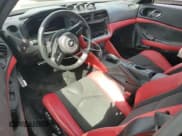 ✅ 2024 Nissan Z Performance • VIN: JN1BZ4BH0RM361682 • Lot: 71400615. Wystawiony na Copart z przebiegiem 4 100 mil. Bezpłatny archiwum sprzedaży aukcyjnych z USA i szczegółowy raport historii pojazdu na DreamBid. Zdjęcie 8.