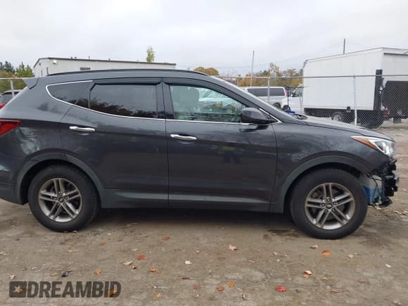 ✅ 2017 Hyundai Santa Fe 2.4L • VIN: 5XYZUDLB8HG383854 • Lot: 43503557. Listed on IAAI with 97,144 mi. Free auction sales archive from the USA and detailed vehicle history report at DreamBid. Image 14.