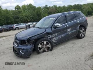 ✅ 2015 Jeep Grand Cherokee Overland • VIN: 1C4RJFCT0FC113614 • Lot: 67475365. Listed on Copart with 122,094 mi. Free auction sales archive from the USA and detailed vehicle history report at DreamBid. Image 1.