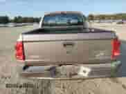 2010 Dodge Dakota Bighorn/Lonestar with VIN 1D7CW3GK4AS199621, listed as a Copart auction lot 77797454 with 150,850 mi miles and Salvage title. Bid and sale history available at DreamBid. Image 6.