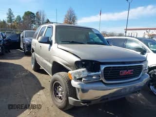 ✅ 2002 GMC Yukon SLT • VIN: 1GKEK13Z12R149729 • Lot: 43690941. Listed on IAAI with 214,772 mi. Free auction sales archive from the USA and detailed vehicle history report at DreamBid. Image 1.