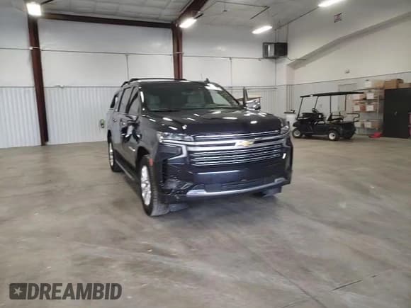 ✅ 2021 Chevrolet Suburban Premier • VIN: 1GNSCFKD2MR318276 • Lot: 37848743. Wystawiony na Copart z przebiegiem 33 165 mil. Bezpłatny archiwum sprzedaży aukcyjnych z USA i szczegółowy raport historii pojazdu na DreamBid. Zdjęcie 12.