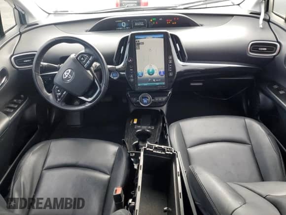 2021 Toyota Prius LE z VIN JTDKAMFP6M3186049, wystawiony jako Copart lot #81289905 z przebiegiem 271 061 mil mil oraz Szkoda całkowita • Salvage title. Historia ofert i sprzedaży dostępna na DreamBid. Obrazek 8.