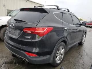 ✅ 2016 Hyundai Santa Fe • VIN: 5XYZWDLA4GG325448 • Лот: 43574324. Опубликован ранее на Copart с пробегом Не указан. Бесплатный доступ к архиву аукционных продаж из США и подробный отчёт об истории автомобиля на DreamBid. Изображение 3.