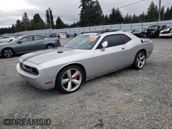 2010 Dodge Challenger SRT-8 z VIN 2B3CJ7DW7AH270018, wystawiony jako Copart lot #72088594 z przebiegiem Nie podano mil oraz Szkoda całkowita • Salvage title. Historia ofert i sprzedaży dostępna na DreamBid. Obrazek 1.