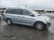 ✅ 2009 Honda Odyssey EX-L • VIN: 5FNRL38749B031641 • Lot: 90673625. Wystawiony na Copart z przebiegiem 223 791 mil. Bezpłatny archiwum sprzedaży aukcyjnych z USA i szczegółowy raport historii pojazdu na DreamBid. Zdjęcie 4.