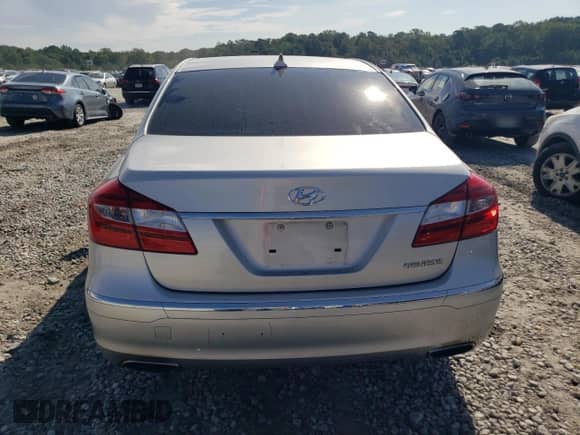 2013 Hyundai Genesis 3.8L z VIN KMHGC4DD4DU233206, wystawiony jako Copart lot #71347874 z przebiegiem 59 238 mil mil oraz Szkoda całkowita • Salvage title. Historia ofert i sprzedaży dostępna na DreamBid. Obrazek 6.