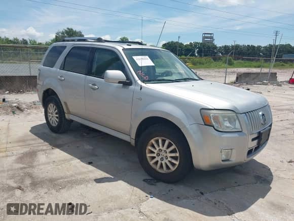 2009 Mercury Mariner Premier with VIN 4M2CU97779KJ00665, listed as a IAAI auction lot 42698060 with 162,205 mi miles and . Bid and sale history available at DreamBid. Image 1.