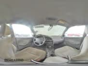 ✅ 2003 Kia Spectra • VIN: KNAFB121935265035 • Lot: 86407934. Wystawiony na Copart z przebiegiem 201 586 mil. Bezpłatny archiwum sprzedaży aukcyjnych z USA i szczegółowy raport historii pojazdu na DreamBid. Zdjęcie 13.