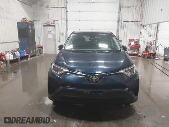 ✅ 2018 Toyota RAV4 LE • VIN: 2T3BFREV6JW767297 • Lot: 43736278. Listed on IAAI with 99,323 mi. Free auction sales archive from the USA and detailed vehicle history report at DreamBid. Image 13.
