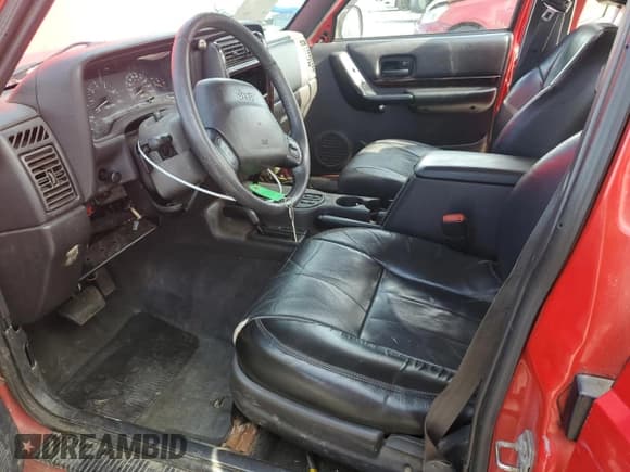 ✅ 2001 Jeep Cherokee Sport • VIN: 1J4FF58S51L573496 • Lot: 68876345. Listed on Copart with 168,843 mi. Free auction sales archive from the USA and detailed vehicle history report at DreamBid. Image 7.