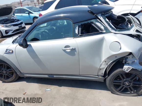 ✅ 2014 MINI Coupe S • VIN: WMWSX3C55ET772879 • Lot: 42979439. Listed on IAAI with 102,797 mi. Free auction sales archive from the USA and detailed vehicle history report at DreamBid. Image 13.