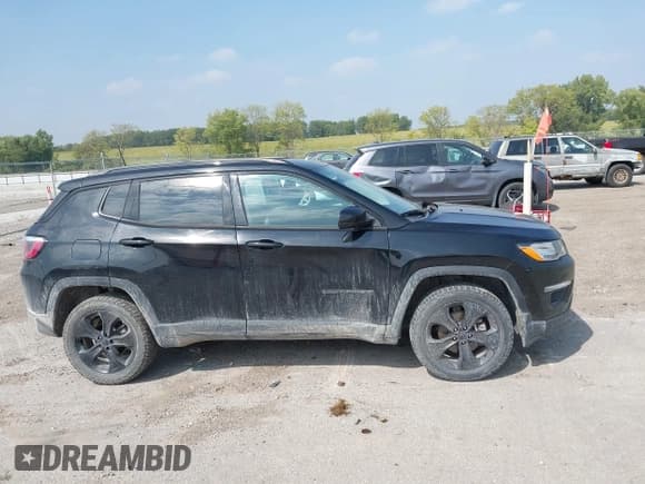 ✅ 2019 Jeep Compass Latitude • VIN: 3C4NJDBB9KT631067 • Lot: 43156049. Listed on IAAI with 127,713 mi. Free auction sales archive from the USA and detailed vehicle history report at DreamBid. Image 13.
