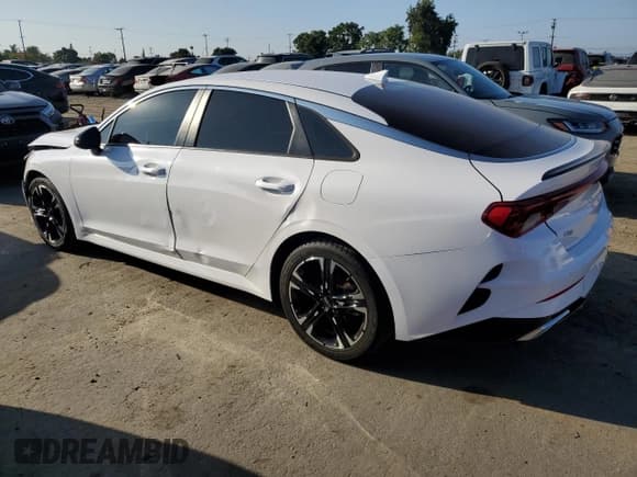 ✅ 2022 Kia K5 GT-Line • VIN: 5XXG64J23NG124919 • Лот: 84924835. Опубликован ранее на Copart с пробегом 48 611 миль. Бесплатный доступ к архиву аукционных продаж из США и подробный отчёт об истории автомобиля на DreamBid. Изображение 2.