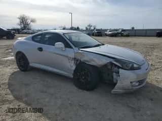 2008 Hyundai Tiburon GS z VIN KMHHM66D68U296212, wystawiony jako Copart lot #88536725 z przebiegiem 116 240 mil mil oraz Szkoda całkowita • Salvage title. Historia ofert i sprzedaży dostępna na DreamBid. Obrazek 4.