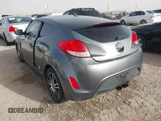 ✅ 2015 Hyundai Veloster RE:FLEX • VIN: KMHTC6AD1FU232984 • Lot: 41570593. Wystawiony na IAAI z przebiegiem 180 435 mil. Bezpłatny archiwum sprzedaży aukcyjnych z USA i szczegółowy raport historii pojazdu na DreamBid. Zdjęcie 3.