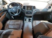 ✅ 2015 Jeep Grand Cherokee Summit • VIN: 1C4RJFJG6FC839841 • Lot: 64731235. Listed on Copart with 184,474 mi. Free auction sales archive from the USA and detailed vehicle history report at DreamBid. Image 8.