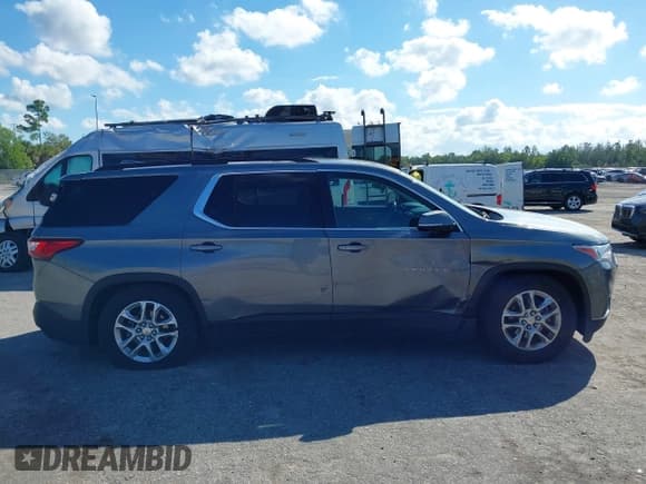 ✅ 2020 Chevrolet Traverse LT Cloth • VIN: 1GNERGKW3LJ165746 • Lot: 43452819. Wystawiony na IAAI z przebiegiem 82 069 mil. Bezpłatny archiwum sprzedaży aukcyjnych z USA i szczegółowy raport historii pojazdu na DreamBid. Zdjęcie 13.
