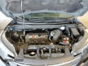 ✅ 2014 Honda CR-V LX • VIN: 2HKRM3H31EH531021 • Lot: 69265425. Listed on Copart with 82,437 mi. Free auction sales archive from the USA and detailed vehicle history report at DreamBid. Image 12.