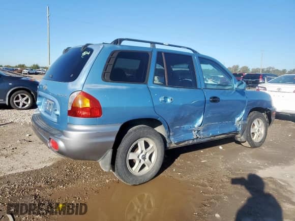 2004 Hyundai Santa Fe with VIN KM8SB12B64U826594, listed as a Copart auction lot 90612545 with 101,208 mi miles and Salvage title. Bid and sale history available at DreamBid. Image 3.