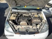 ✅ 2002 Ford Focus ZX5 • VIN: 3FAFP37382R213536 • Lot: 91468935. Wystawiony na Copart z przebiegiem 285 656 mil. Bezpłatny archiwum sprzedaży aukcyjnych z USA i szczegółowy raport historii pojazdu na DreamBid. Zdjęcie 7.