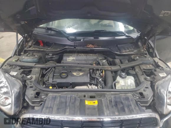 ✅ 2013 MINI Countryman S ALL4 • VIN: WMWZC5C57DWP32208 • Lot: 95294255. Listed on Copart with 124,849 mi. Free auction sales archive from the USA and detailed vehicle history report at DreamBid. Image 11.