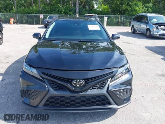 2022 Toyota Camry SE z VIN 4T1T11AK0NU044270, wystawiony jako IAAI lot #42805286 z przebiegiem 49 468 mil mil oraz . Historia ofert i sprzedaży dostępna na DreamBid. Obrazek 12.