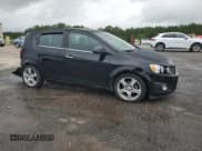 ✅ 2012 Chevrolet Sonic LTZ • VIN: 1G1JE6SH1C4132511 • Lot: 58445765. Listed on Copart with 82,611 mi. Free auction sales archive from the USA and detailed vehicle history report at DreamBid. Image 4.