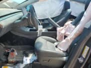 ✅ 2023 Tesla Model Y • VIN: 7SAYGDED7PF963865 • Lot: 69295755. Listed on Copart with 11,750 mi. Free auction sales archive from the USA and detailed vehicle history report at DreamBid. Image 7.