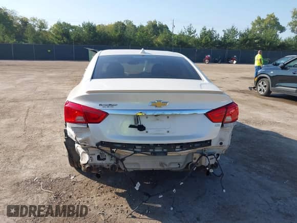 2014 Chevrolet Impala LTZ with VIN 1G1155S32EU122071, listed as a IAAI auction lot 43344345 with 151,734 mi miles and . Bid and sale history available at DreamBid. Image 17.