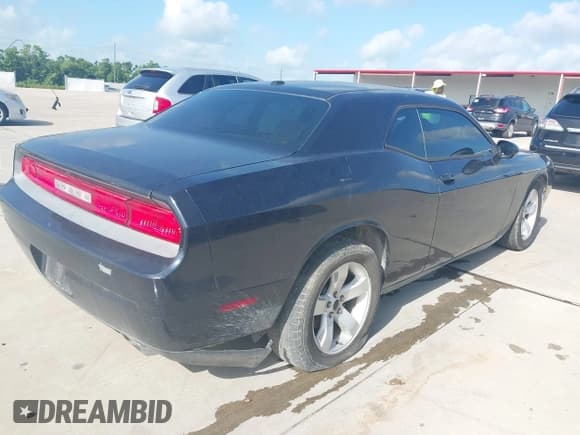 ✅ 2011 Dodge Challenger • VIN: 2B3CJ4DG5BH542655 • Lot: 42580474. Listed on IAAI with 250,322 mi. Free auction sales archive from the USA and detailed vehicle history report at DreamBid. Image 4.