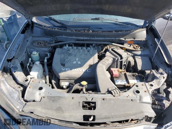 ✅ 2010 Mitsubishi Outlander LS • VIN: JA4JT3AX9AZ603528 • Lot: 66729785. Listed on Copart with 118,147 mi. Free auction sales archive from the USA and detailed vehicle history report at DreamBid. Image 12.