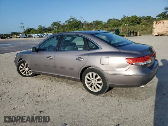2006 Hyundai Azera SE с VIN KMHFC46F96A118552, выставлен на аукционе Copart как лот 50934395 с пробегом 122 210 миль миль и Списание • Salvage title. История ставок и продаж доступна на DreamBid. Изображение 2.