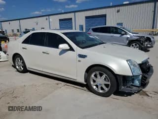 ✅ 2010 Cadillac STS AWD • VIN: 1G6DU6EV0A0117742 • Лот: 72396344. Опубликован ранее на Copart с пробегом 48 766 миль. Бесплатный доступ к архиву аукционных продаж из США и подробный отчёт об истории автомобиля на DreamBid. Изображение 4.